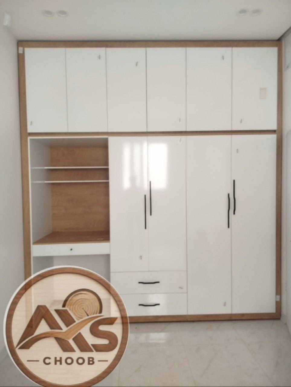 مشاهده طراحی و اجرای کابینت آکس چوب در بلوار شیراز کرمان در سامانه بهبود مشاغل