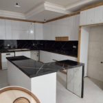 طراحی و اجرای کابینت آکس چوب در بلوار شیراز کرمان